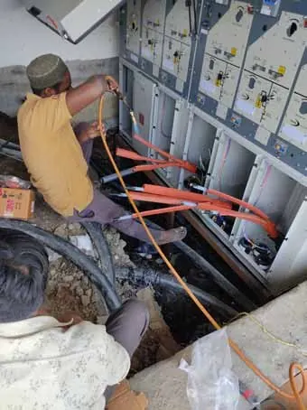 HT cable termination inside a panel